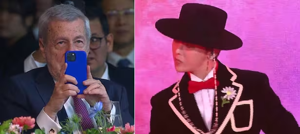 G-Dragon performando no Jantar de Gala da APEC com chapéu coreano, na frente de líderes mundiais.